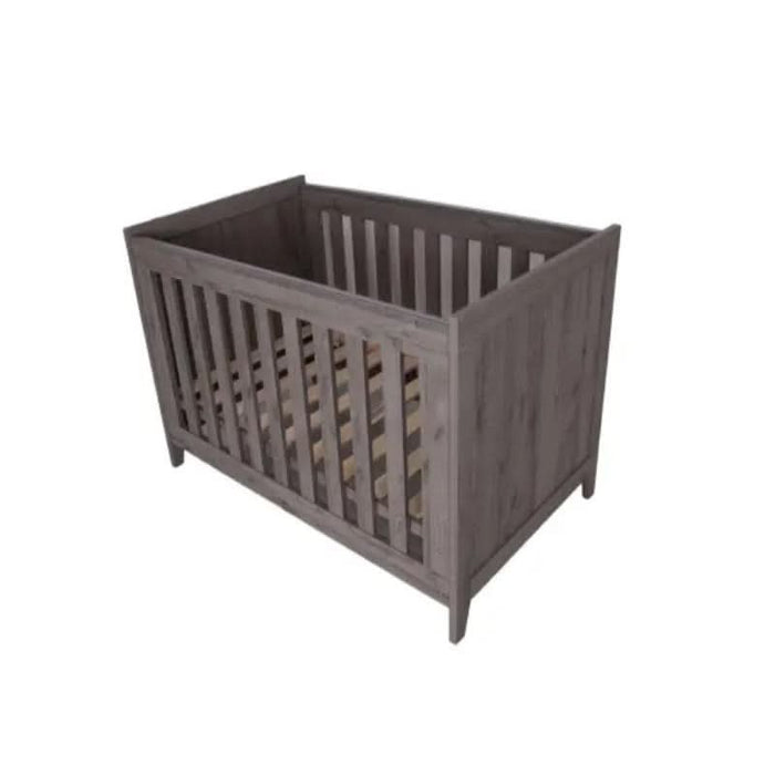 Modern Love N Care Lyon Cot in Dark Grey with a clean, minimalist design in a nursery setting