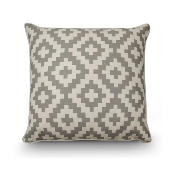 Sophisticated and modern cushion cover displayed in a clean, natural light setting, emphasizing its elegant details