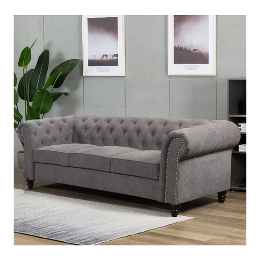 The Grey Manchester 3 Seater Sofa Lounge as a centrepiece in a modern home, symbolizing luxury and relaxation