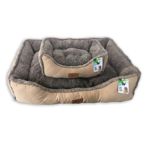Luxurious reversible dog bed with plush fur and cool canvas sides for all-season comfort