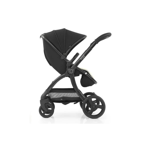 Elegance meets innovation: Love N Care Egg2 Stroller in Just Black gliding through the city.