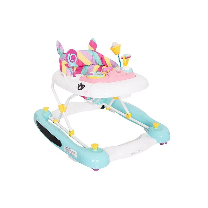 Adorable toddler enjoying the unicorn-themed walker, filled with interactive toys and bright colors