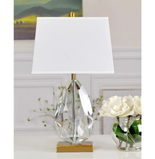 The dazzling Tiffany Diamond Lamp, with its crystalline brilliance, lighting up a modern living space.
