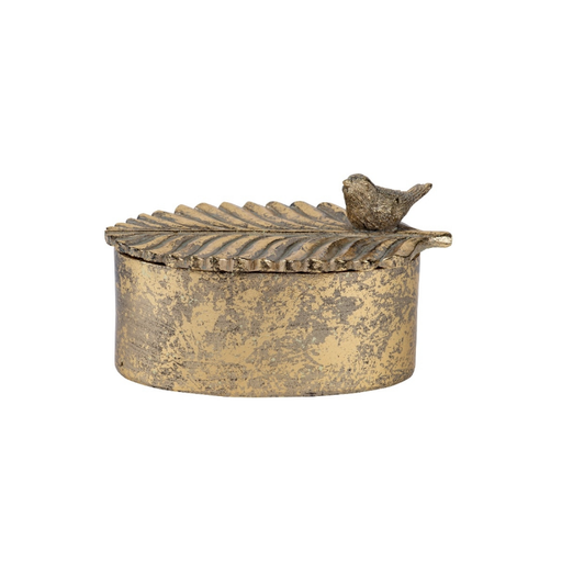 Chic oval trinket box with a charming bird design, perfect for elegant storage and decor.