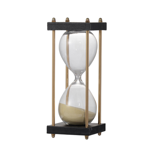The Golden Oasis Hourglass stands, radiating warmth and sophistication in black and gold.