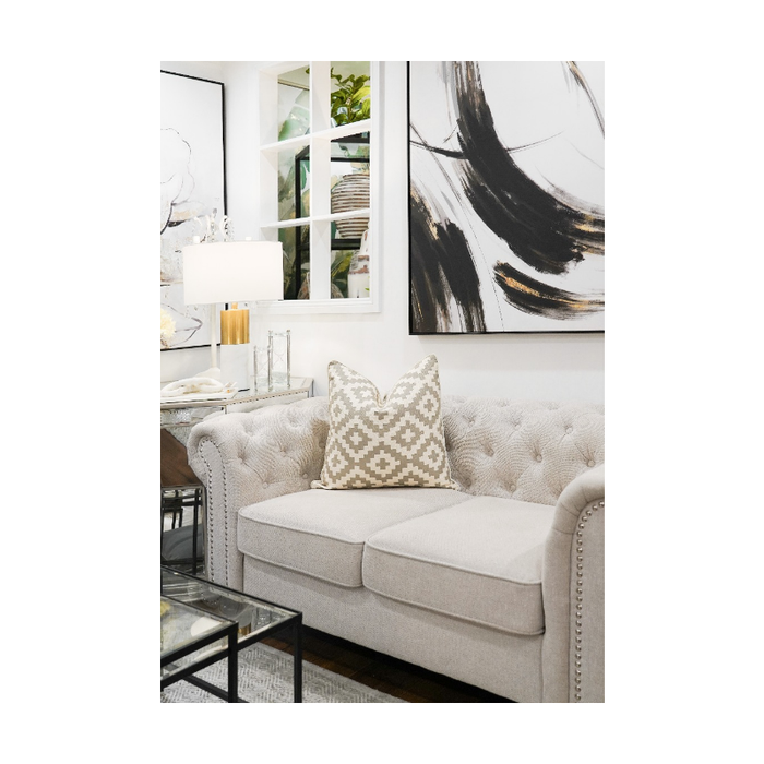 Contemporary cushion cover resting on a chic sofa, enhancing the home ambience
