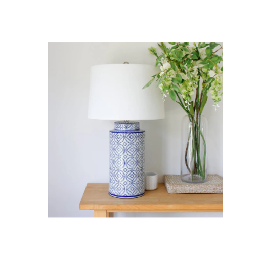 Stylish and modern Mariana Porcelain Lamp perfect for enhancing any bedroom or living room.