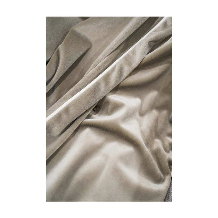 Artistic depiction of the Contrast Couture Throw's versatility in home styling