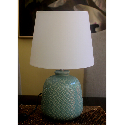 Transform your room into a haven of calm and elegance with our Lily Turquoise Ceramic Lamp