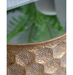 Detailed view of the golden honeycomb pattern on the Honeycomb Gleam Side Table, evoking a sense of refined luxury