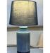 Close-up of Avalon Lamp's exquisite blue ceramic base, adding a splash of sophistication