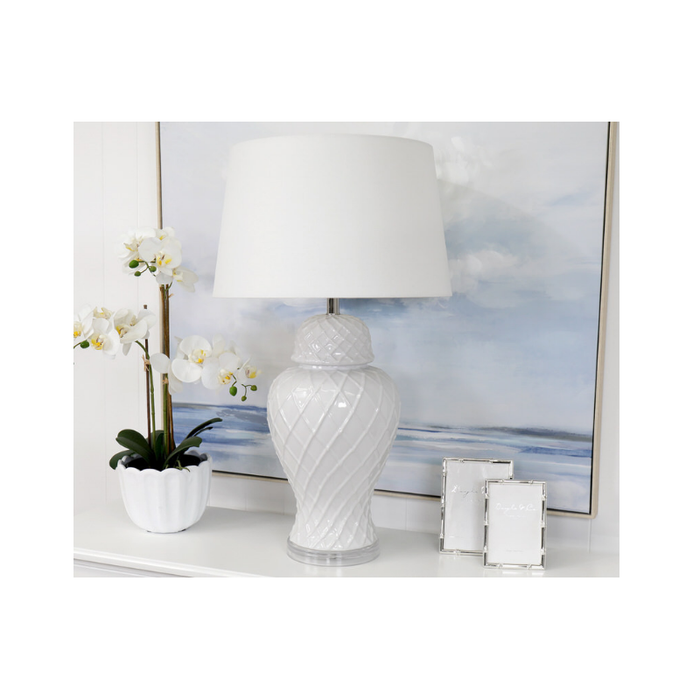 Close-up of Bay Water Lamp's sleek white vase design