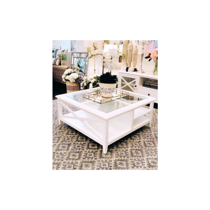 Hampton White Coffee Table with Glass Top and Storage Rack in a Modern Living Room