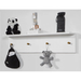 Wall-mounted Fjord Wallshelf fully adorned with baby essentials and decorative items