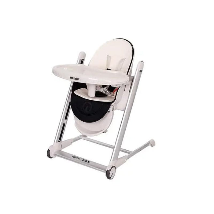 Baby comfortably reclining in the Pandora Highchair with adjustable backrest and safety harness