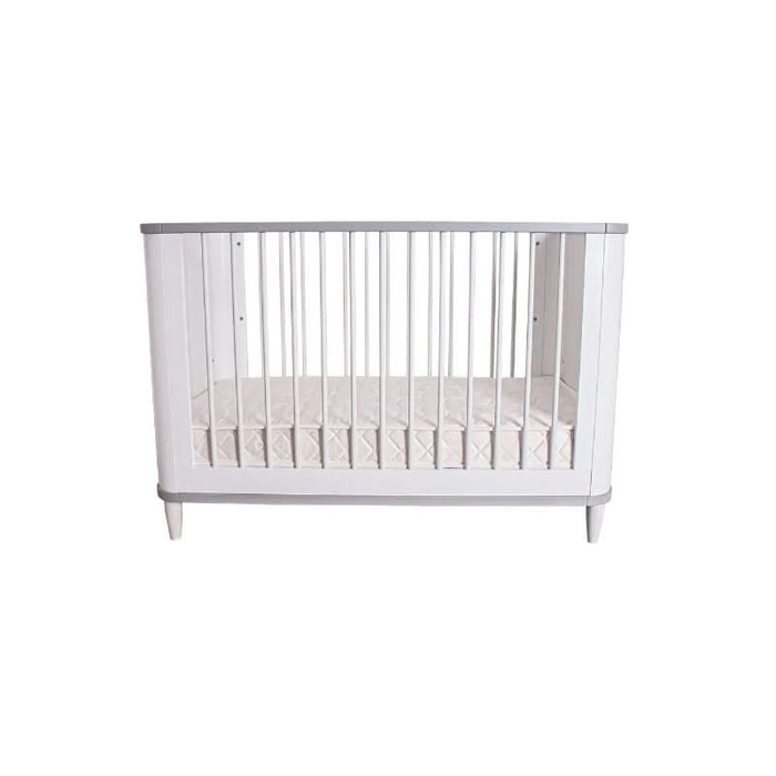 Secure and stylish sleeping environment featuring the Love N Care Noor Cot with slatted sides