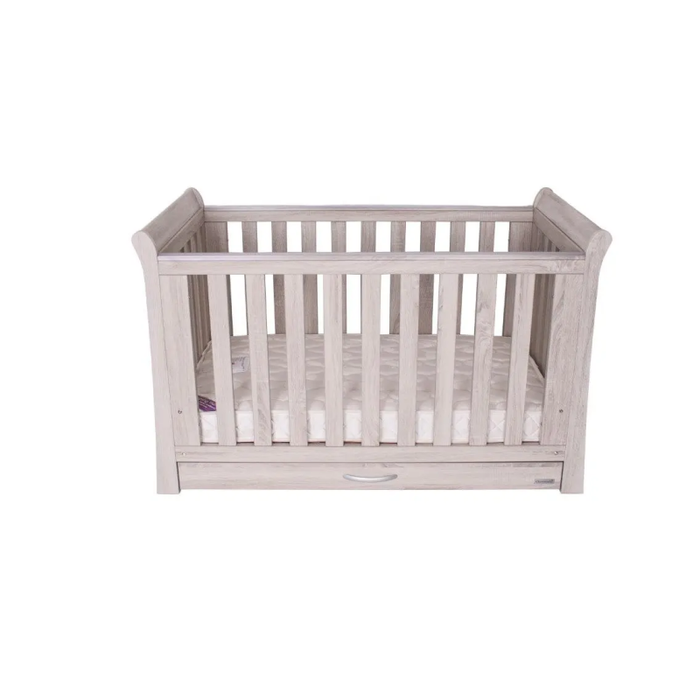 Minimalist and modern Love N Care Noble Cot Ash with strong slatted sides in a nursery