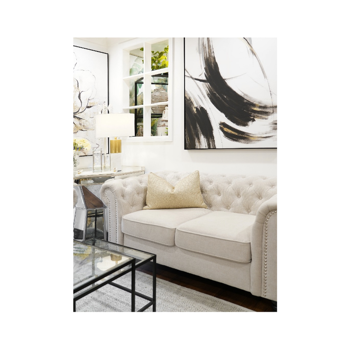 Gold Elegant Living Cushion perfectly styled on a chic grey sofa, blending comfort with style