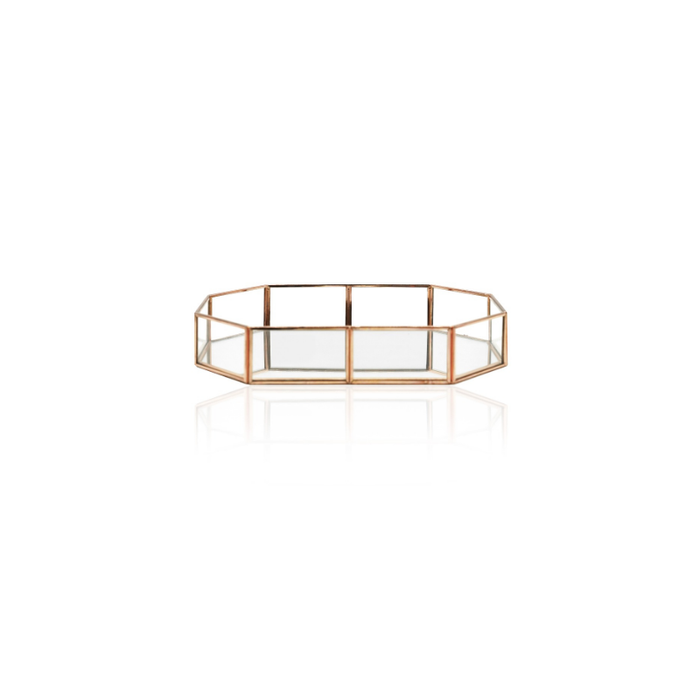 Reflective rose gold finish tray adding elegance to a modern living space