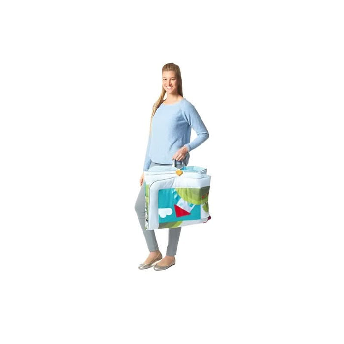 The Meadow Days Super Mat neatly folded and ready for transport with its easy-to-carry handle.