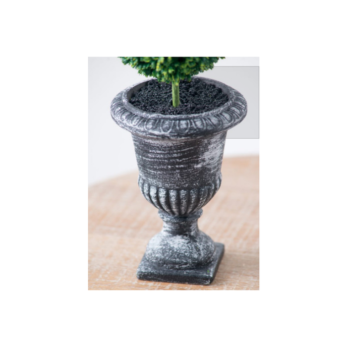 Lush two-tier faux topiary sitting elegantly in a corner, adding a touch of elegance