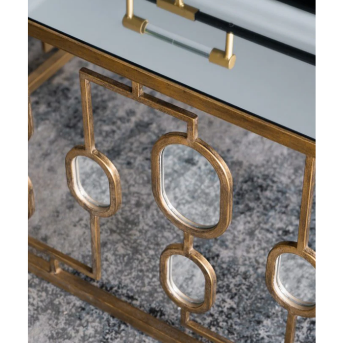 Gleaming Reflections - Sophisticated Gold Coffee Table in a Stylish Setting