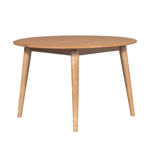 Lipwood Elegance round oak dining table in a cozy dining room setting