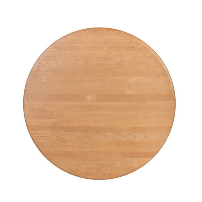 Crafted for intimacy - Lipwood Elegance round oak table in a well-lit dining area